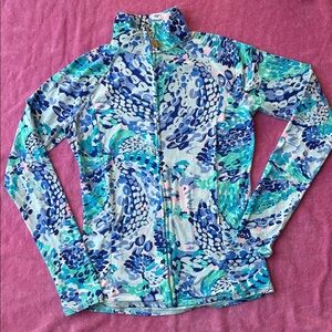 Lilly Pulitzer Luxletic full zip Jacket with zip pockets and thumb holes.